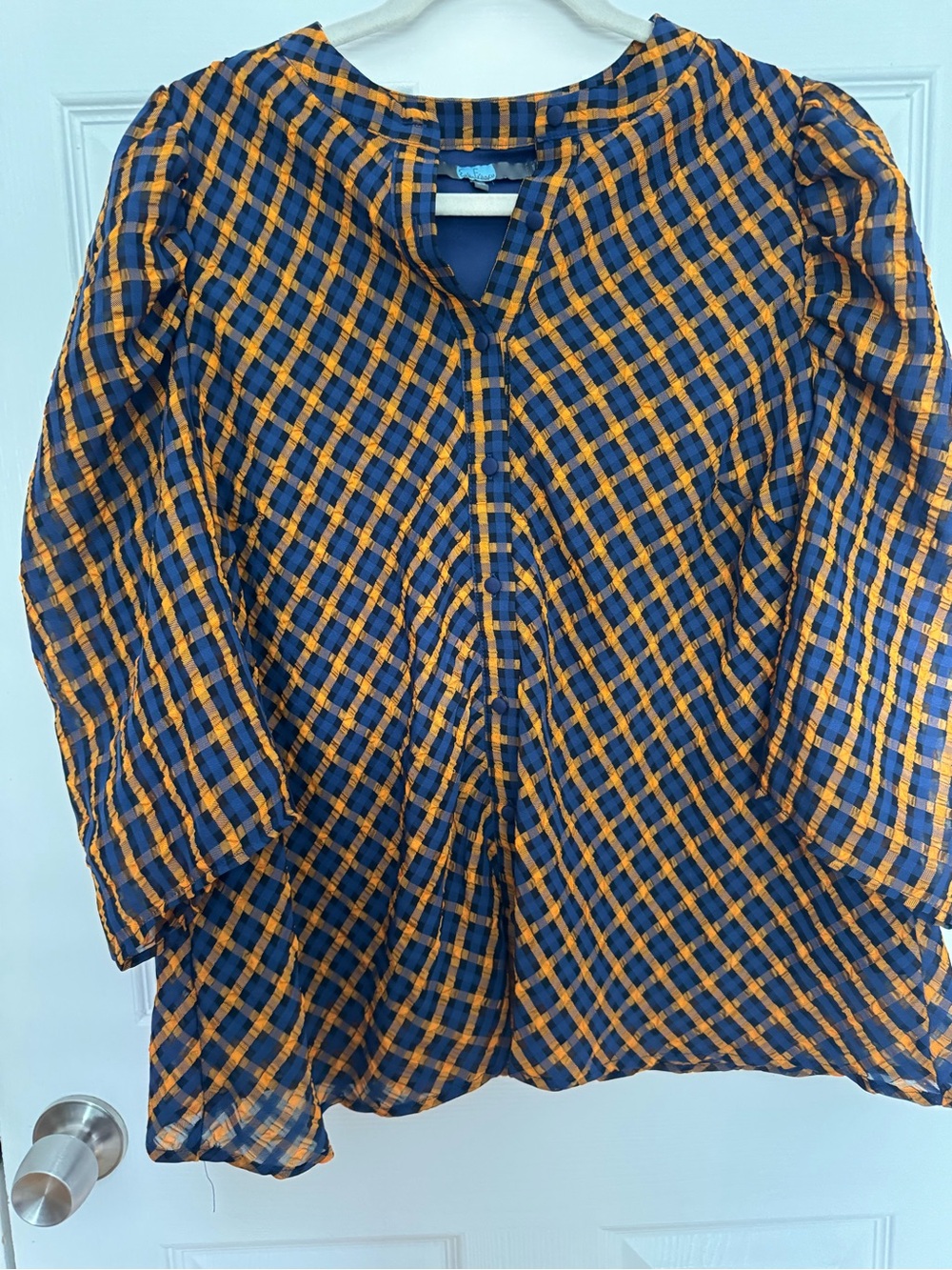 Anthro Navy and Orange Plaid Lightweight Button Front Top

Eva Franco